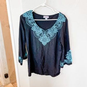 Black and turquoise western top.